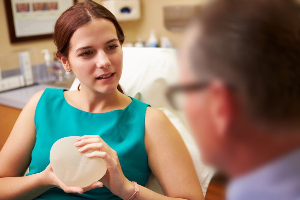 woman with breast implant